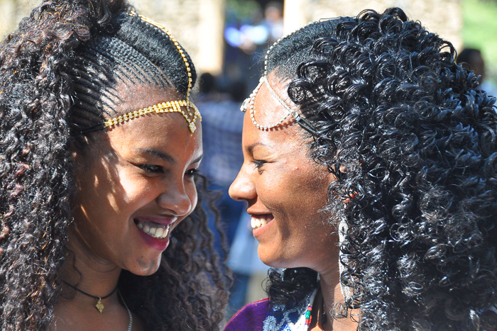 Portrait of two young women with matching haorstyles